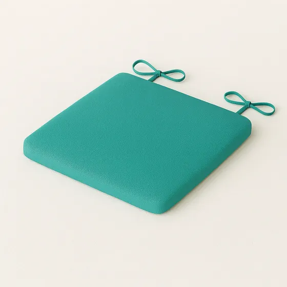 Teal outdoor dining chair seat pad with tie straps