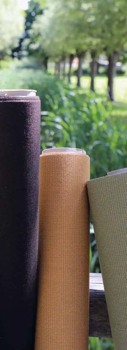 Dickson Orchestra acrylic fabric rolls standing outdoors