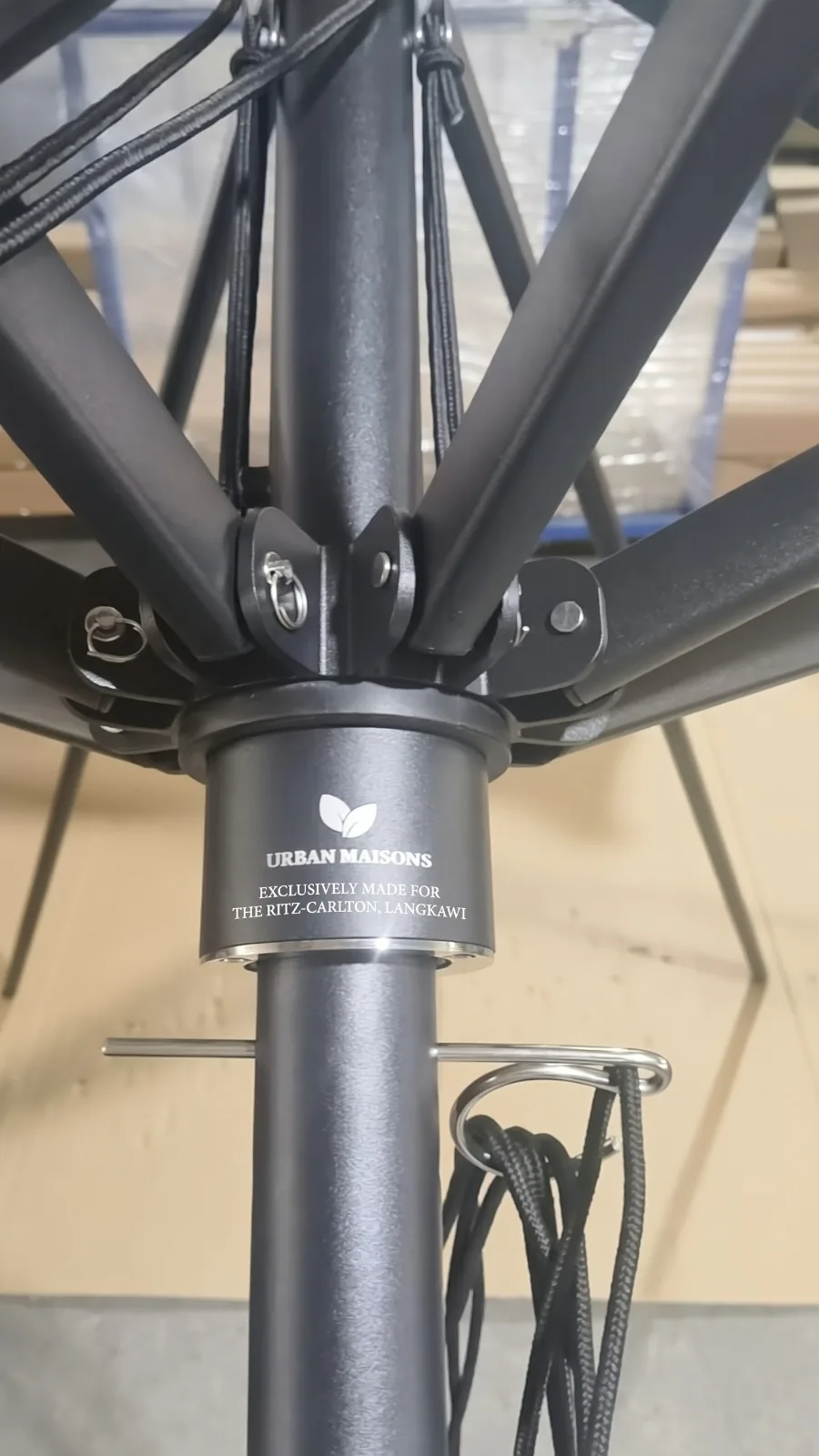 Heavy duty umbrella hub marked Exclusively made for The Ritz-Carlton, Langkawi