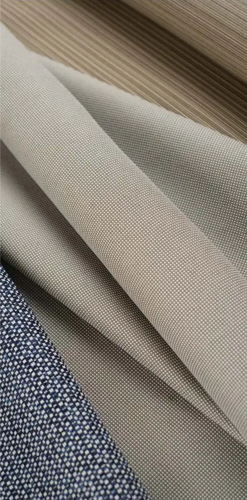 Sunproof Premium olefin outdoor fabric in neutral plains and textured weaves